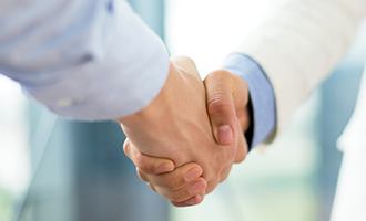 Two people shaking hands