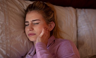 Woman with chronic jaw pain in Westminster