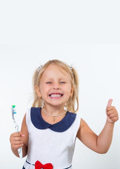 happy girl with toothbrush