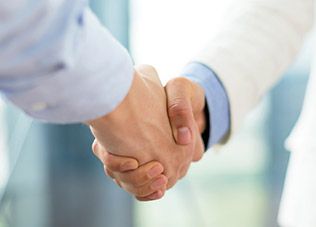 Two people shaking hands