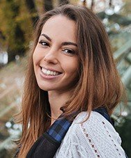 Smiling woman outdoors