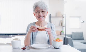 Woman eating her lunch while wearing 