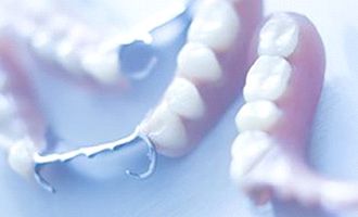 Partial dentures lying on a table