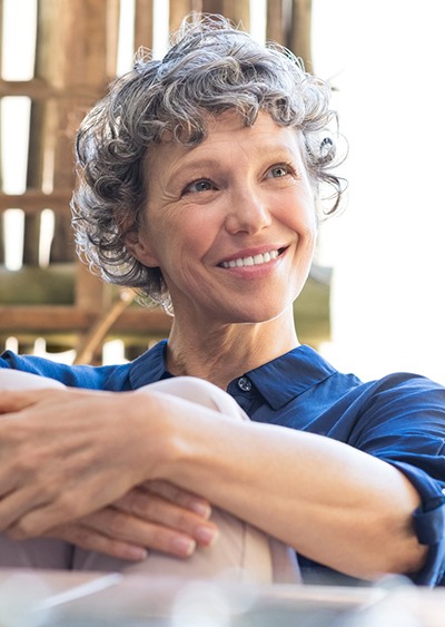 Woman with dentures in Westminster