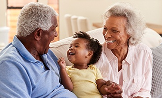 Grandparents enjoying time with their grandchild