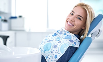 Smiling woman in dental chair