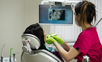 Patient receiving intraoral photos