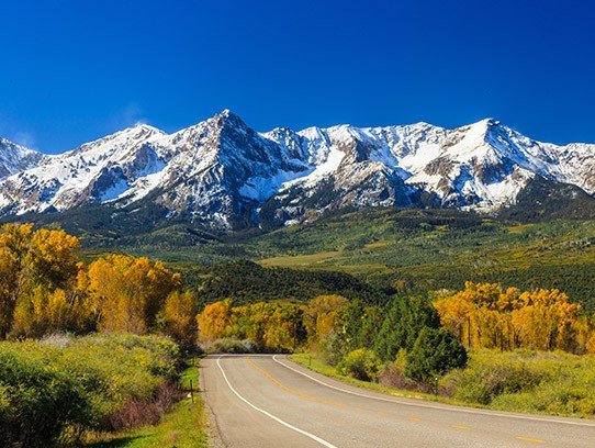 Highway with mountains in background