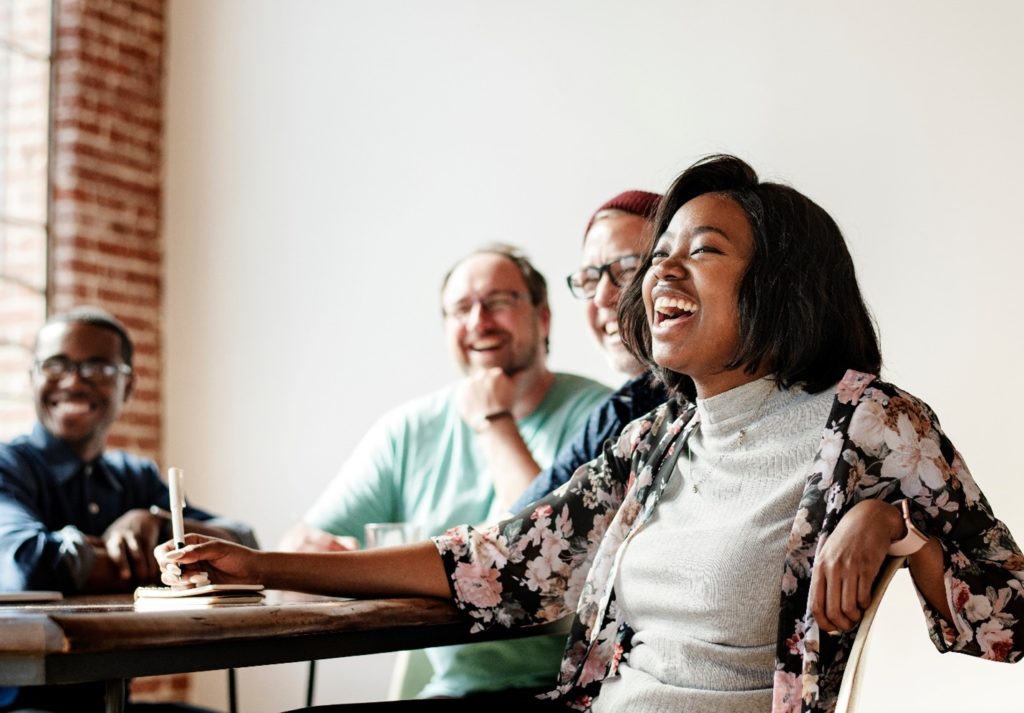 Group of colleagues smiling at work